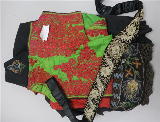 A quantity of Indian embroidered silk jackets, etc